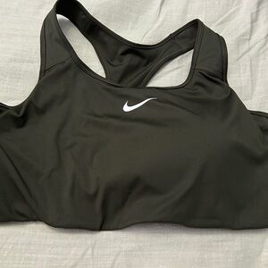 2x green Nike sports bra with pads